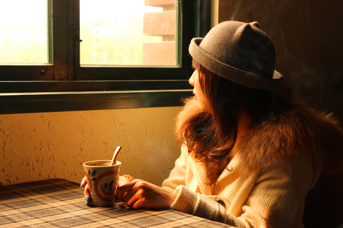 人像咖啡馆里的午后,阳光总是那么的温馨.