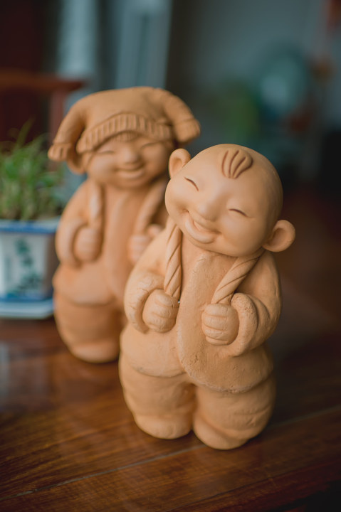 老爸给老妈买的泥娃娃    他说这张照片应该起名叫    每一个幸福的